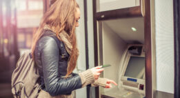 Woman using an ATM