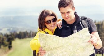 Young couple looking at a map