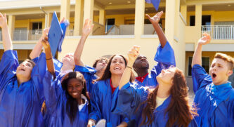 Graduates tossing their caps in the air