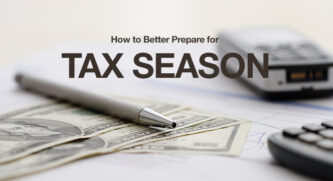 How to better prepare for tax season, with money a pen, and a calculator in the background