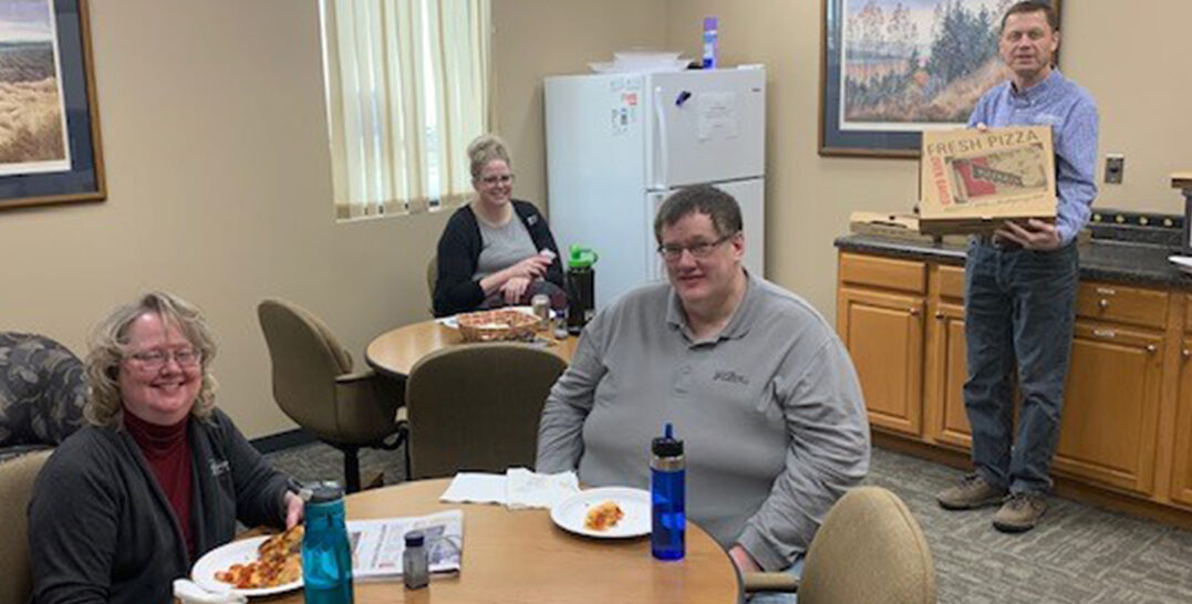 Bankers having lunch in the break room